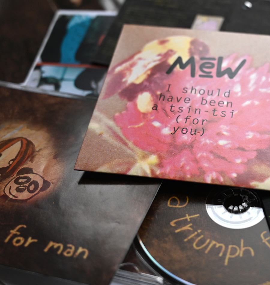Collection of early Mew cd covers: First promotion single Tsin-tsi, debut cd A Triumph For Man